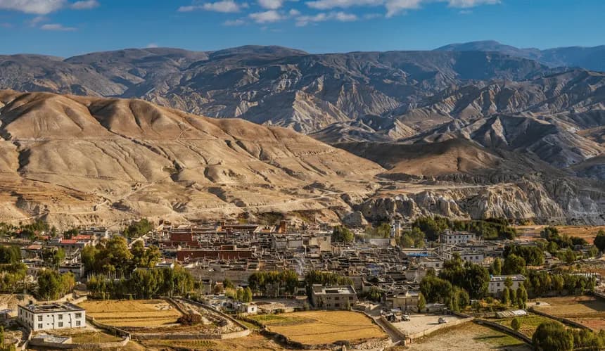 Rust-colored valleys of Upper Mustang, Nepal — a self-drive EV road trip destination